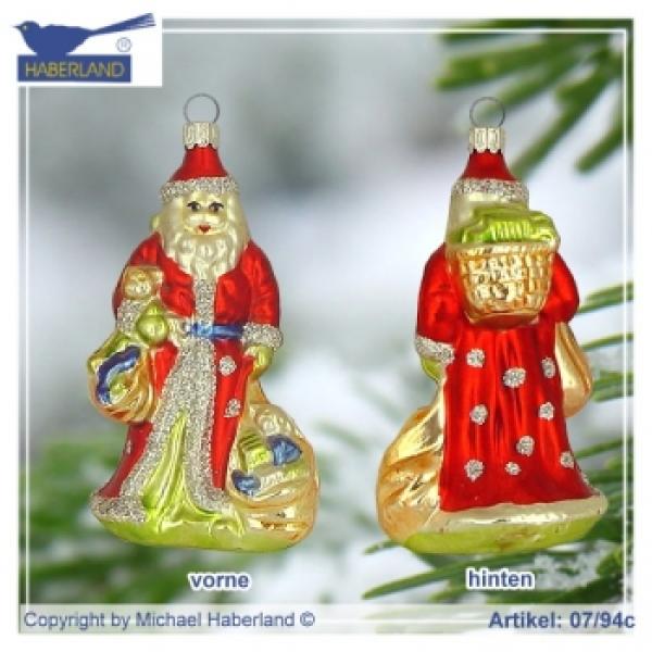 Weihnachtsmann mit Korb und Säcken