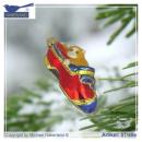 Katze im roten Schuh